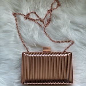 Rose gold clutch with chain